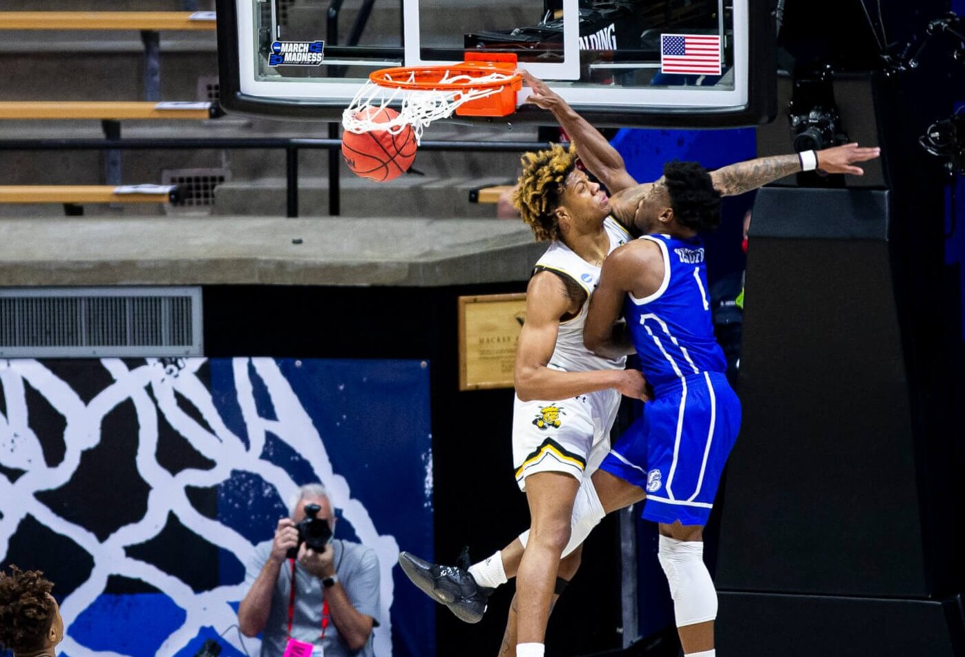 Joseph Yesufu dunks over opponent