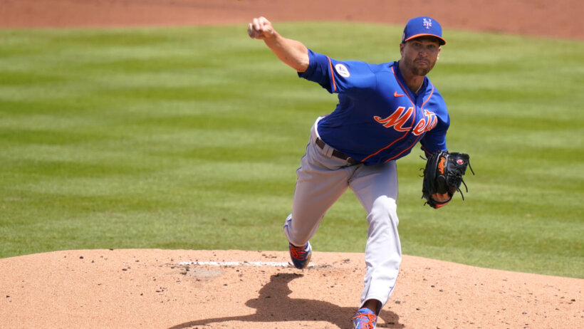 New York Mets starting pitcher Jacob deGrom throwing a pitch during a MLB game.