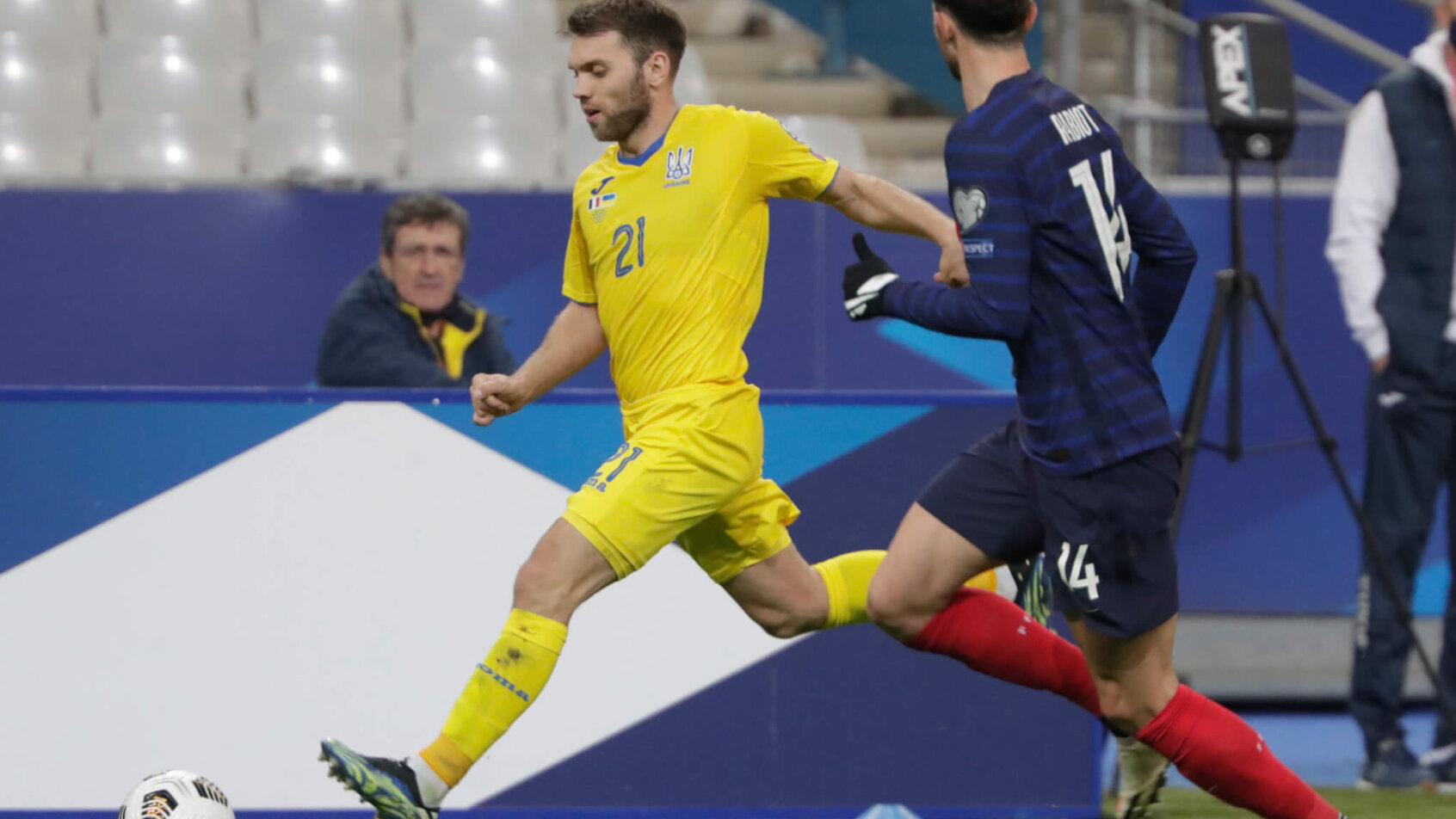 Oleksandr Karavaev fighting for the ball with France's Adrien Rabiot during the World Cup Group D match