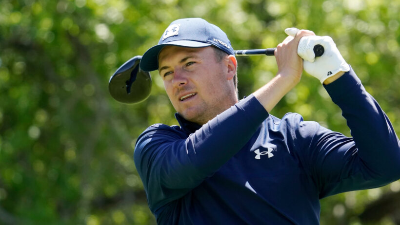 Jordan Spieth watching his drive on the follow through during the first round of the Texas Open golf tournament.