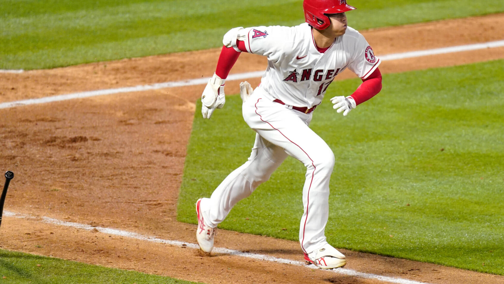 Shohei Ohtani running to first base