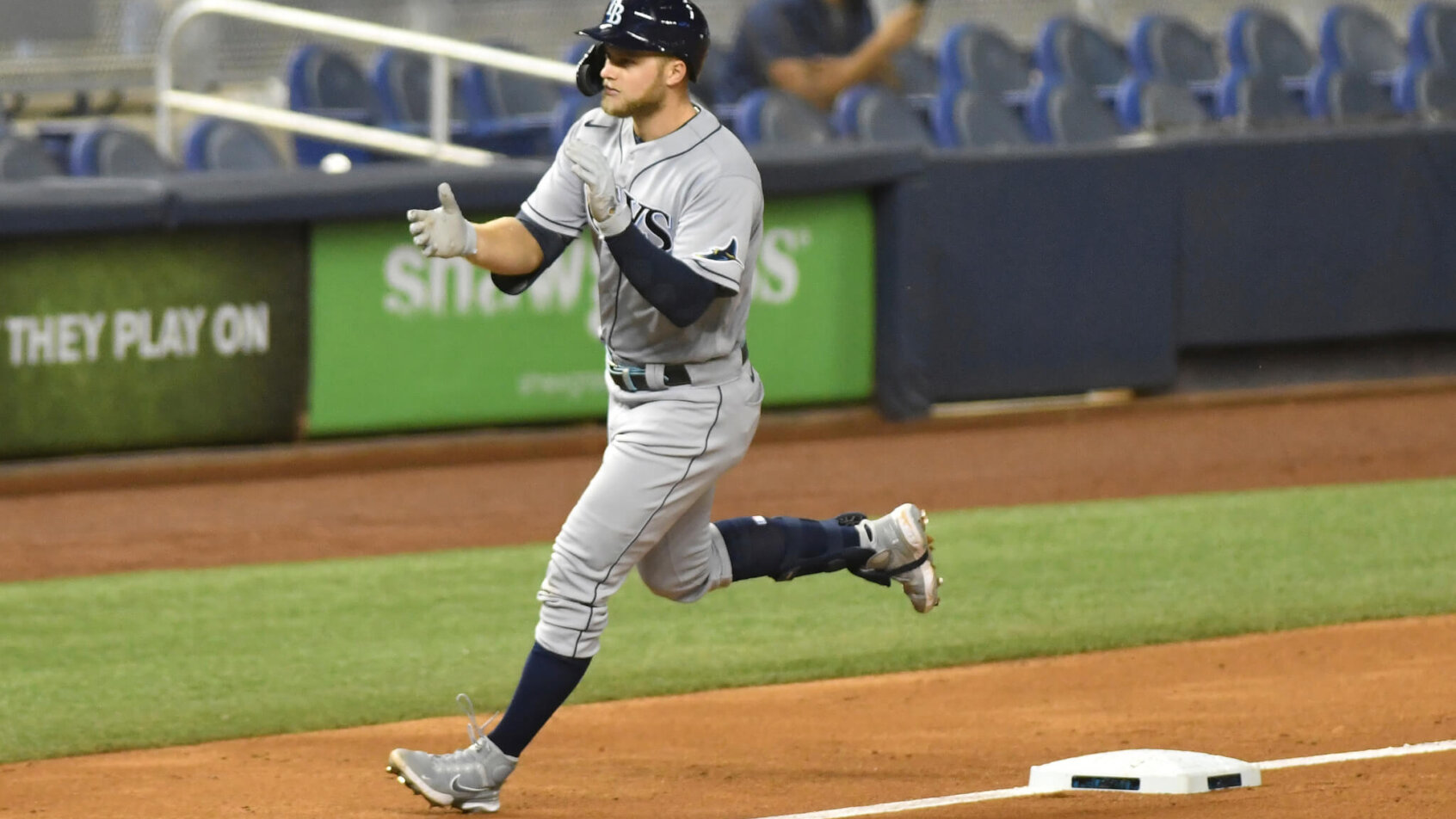 Austin Meadows rounds third clapping