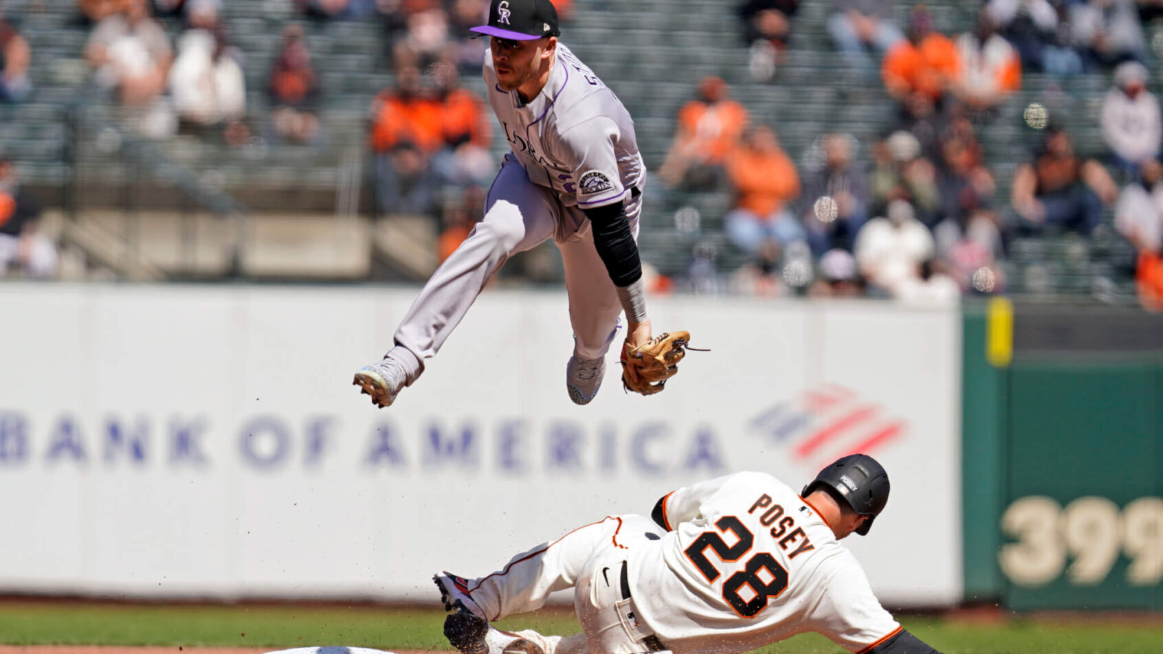 Buster Posey sliding into second base