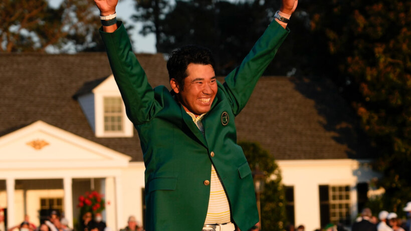 Hideki Matsuyama celebrates his first major championship