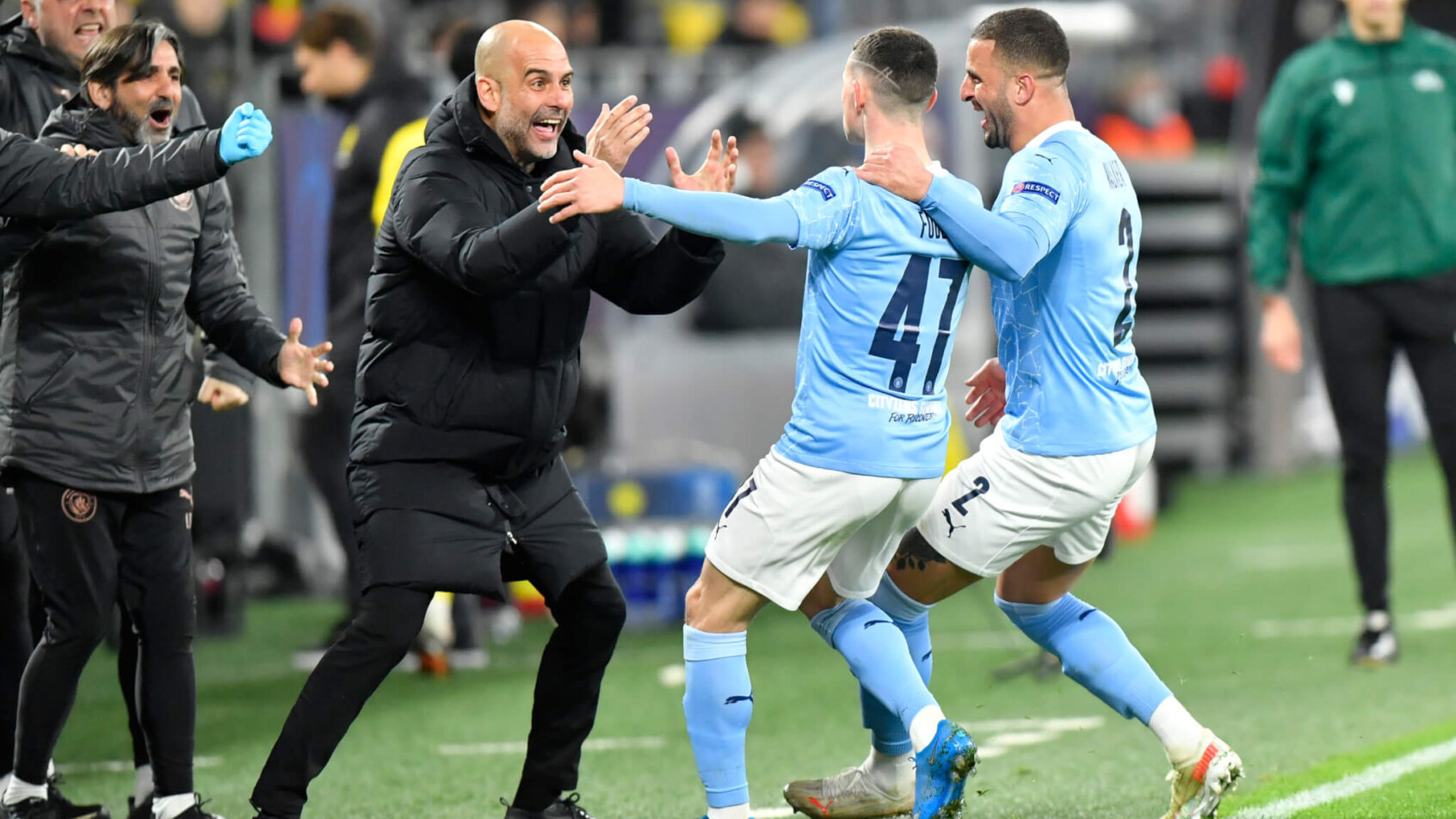 Manchester City players and coach celebrate