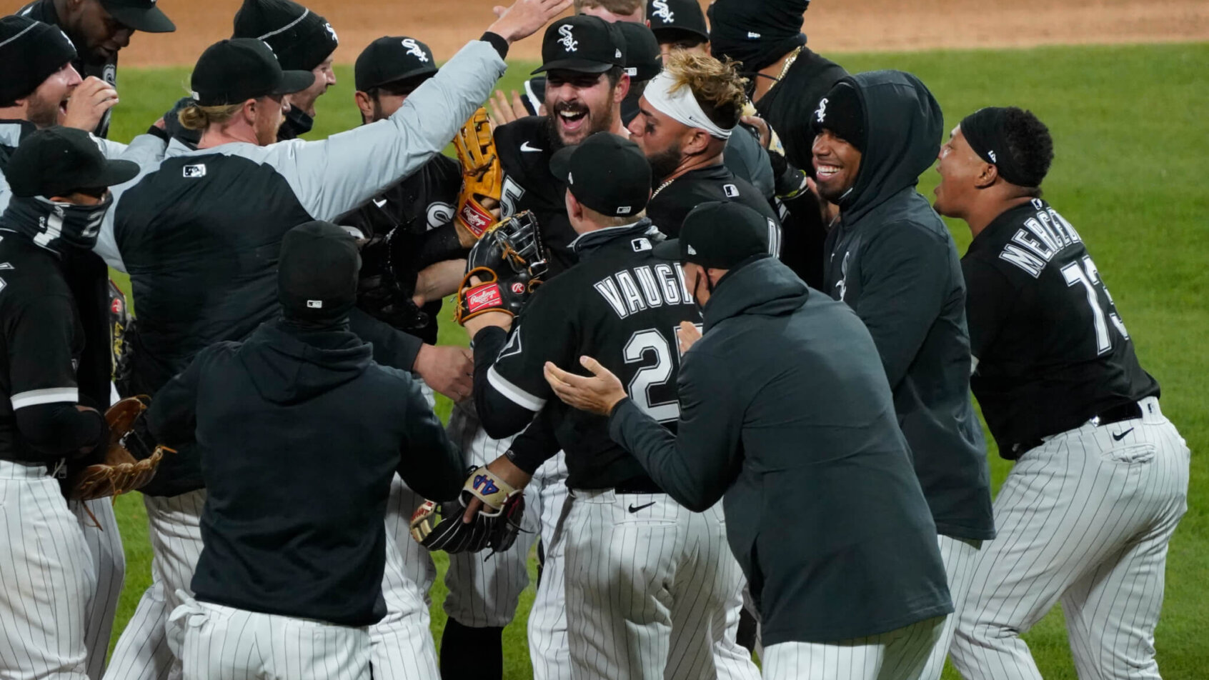 Chicago White Sox pitcher Carlos Rodon celebrating with teammates after throwing a no-hitter