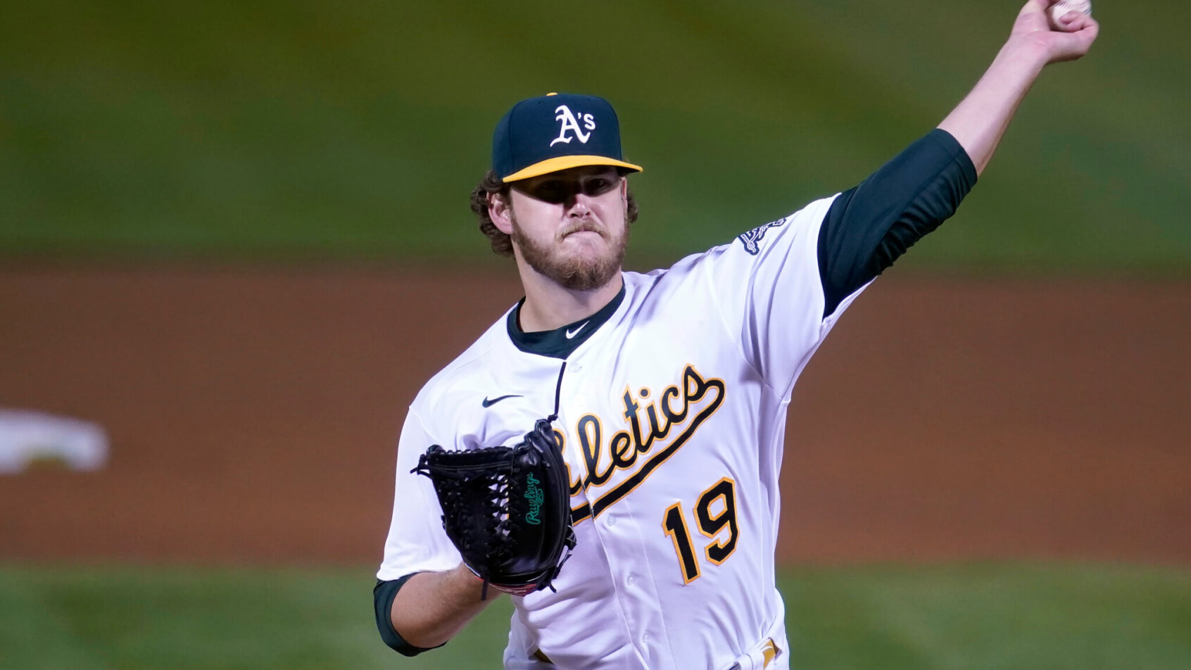 Cole Irvin throwing pitch