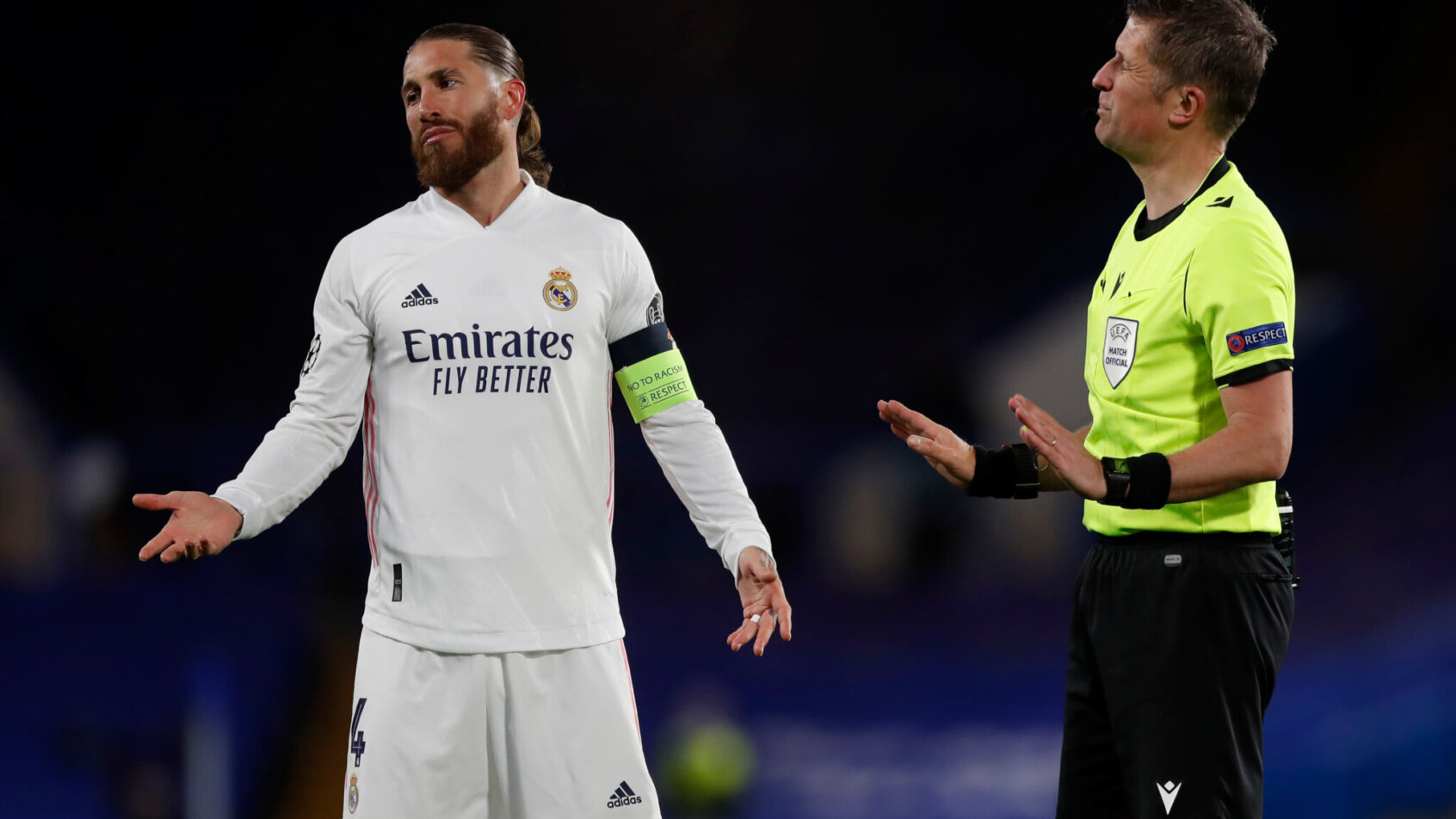 Sergio Ramos gesturing while speaking to referee