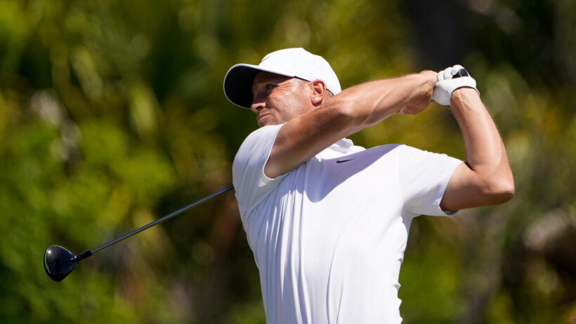 Alex Noren admires a tee shot