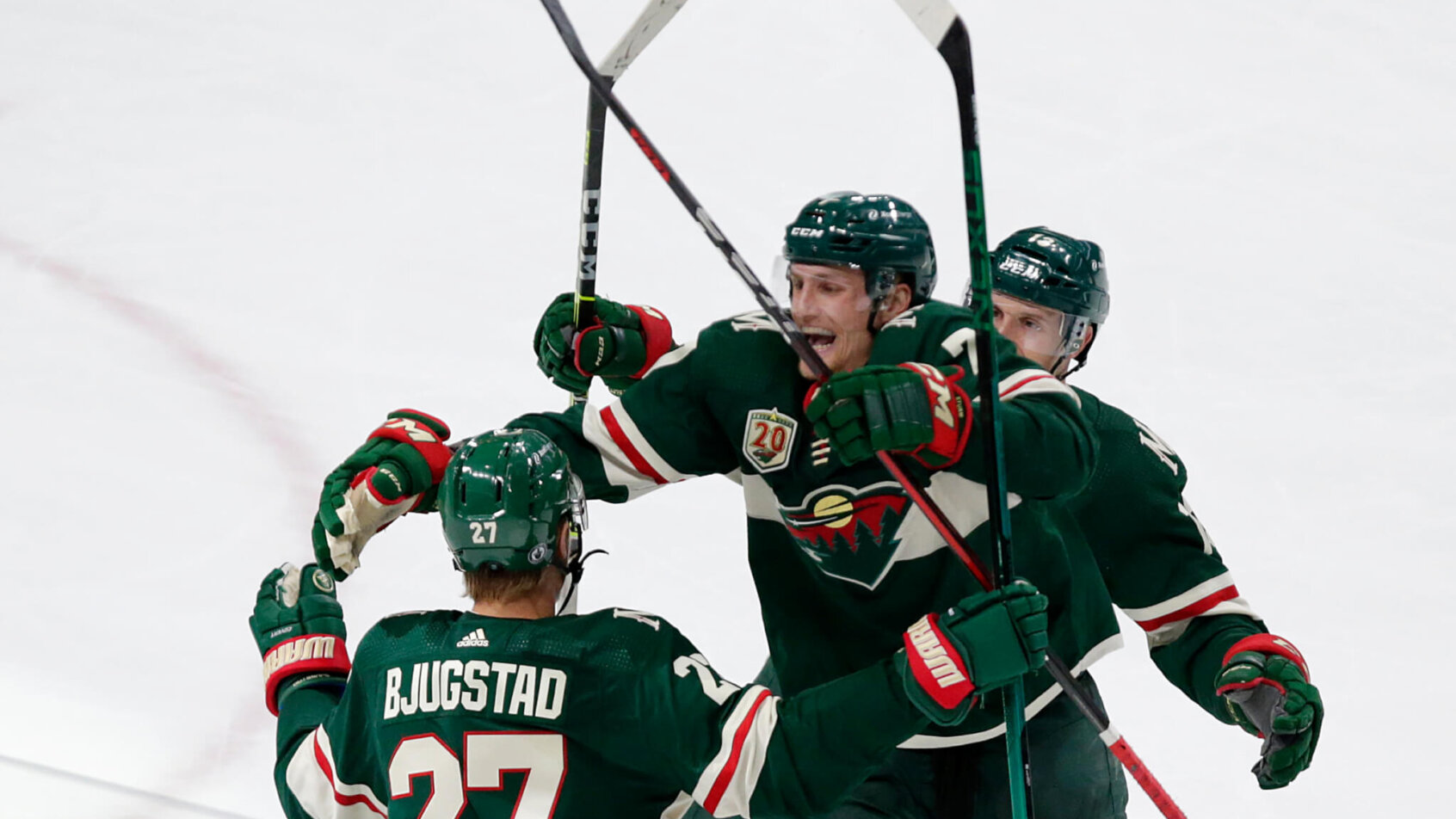 Minnesota Wild players celebrate goal