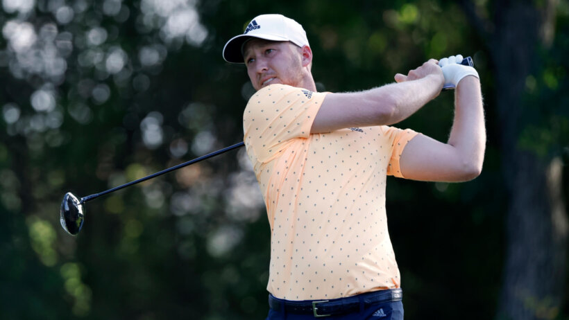 Daniel Berger admires a tee shot