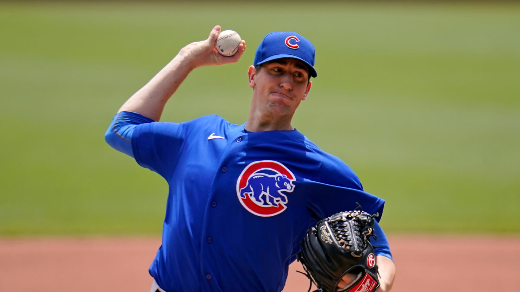 Chicago Cubs starting pitcher Kyle Hendricks throwing a pitch during a baseball game.
