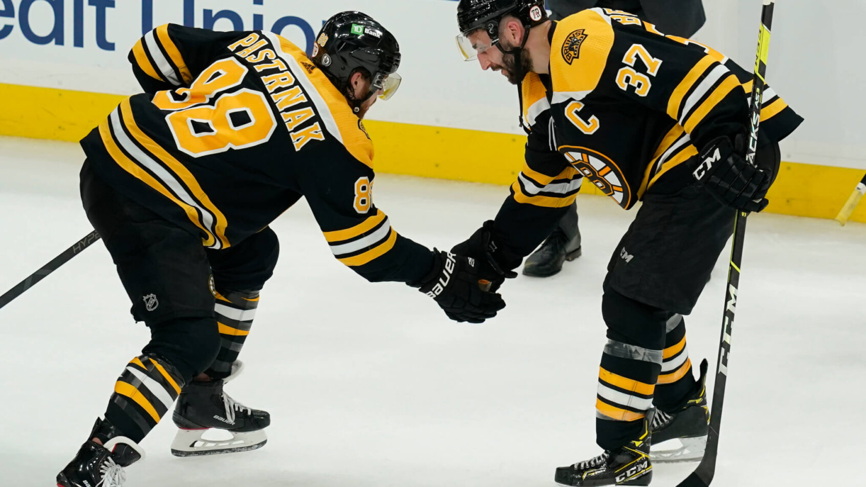 David Pastrnak, Patrice Bergeron, Boston Bruins celebrate