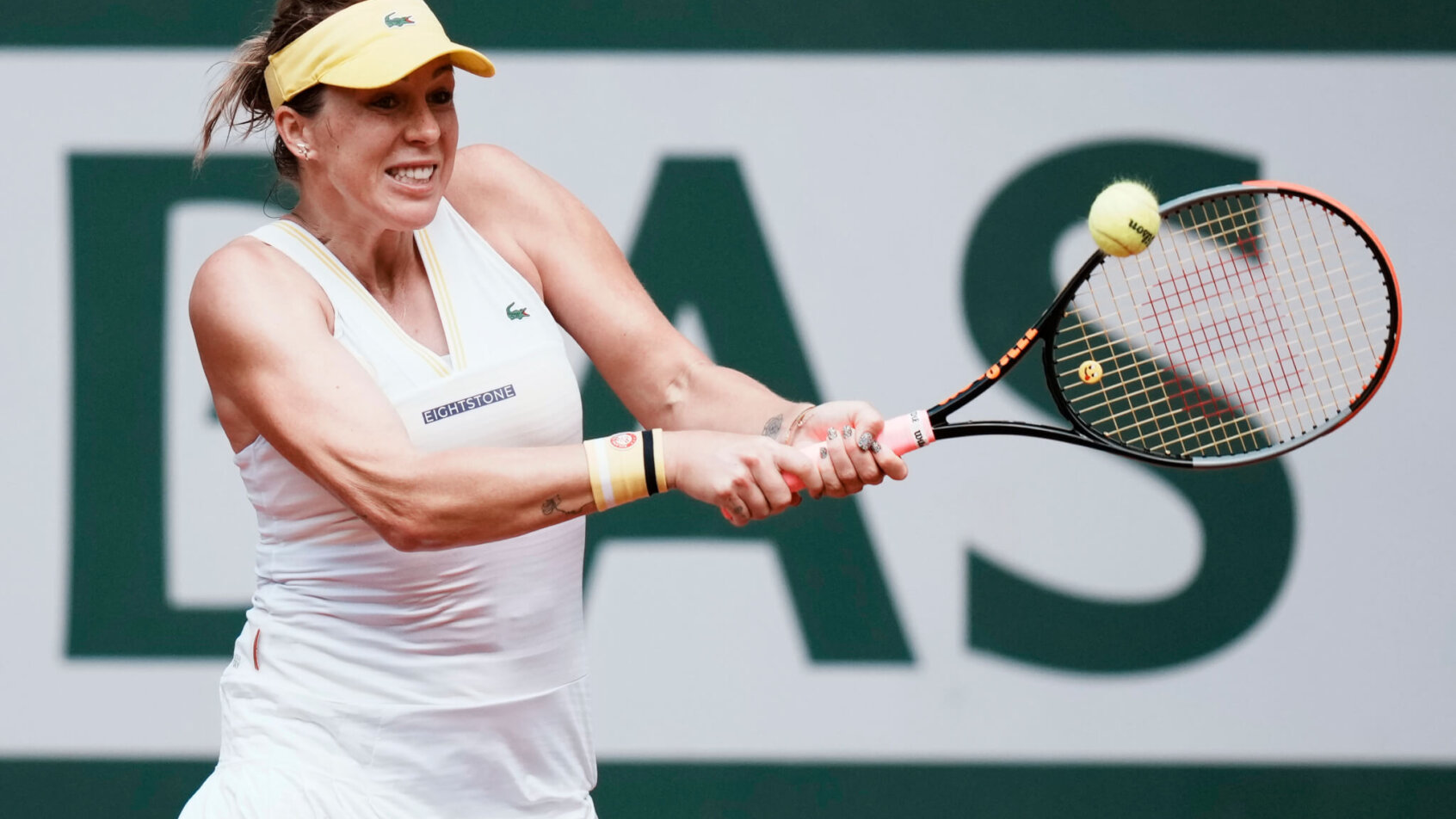 Anastasia Pavlyuchenkova hitting a backhand return during a match at the French Open.