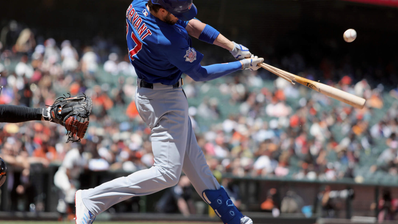 Kris Bryant mid-swing