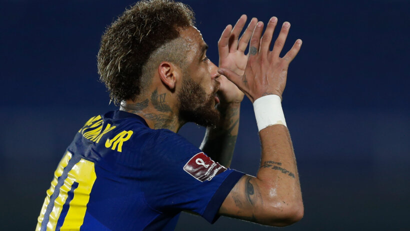 Neymar reacting to a call during a soccer match.