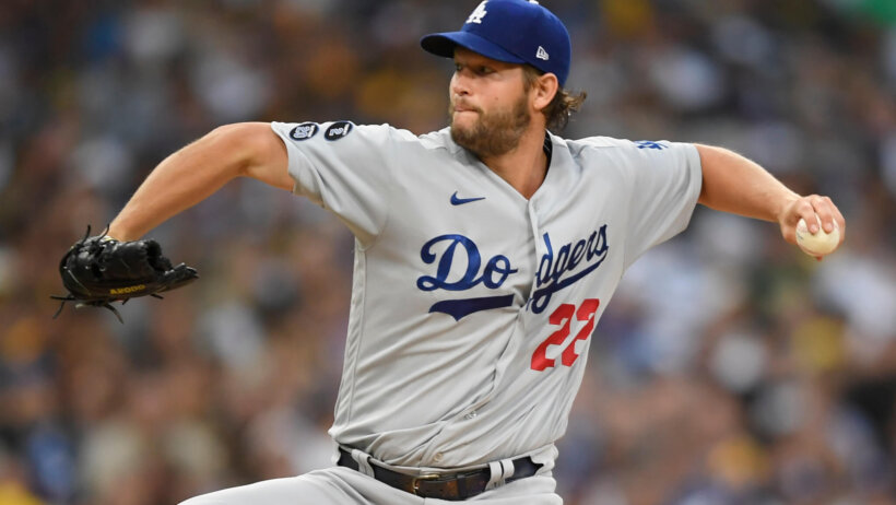 Clayton Kershaw throwing a pitch during a MLB game.