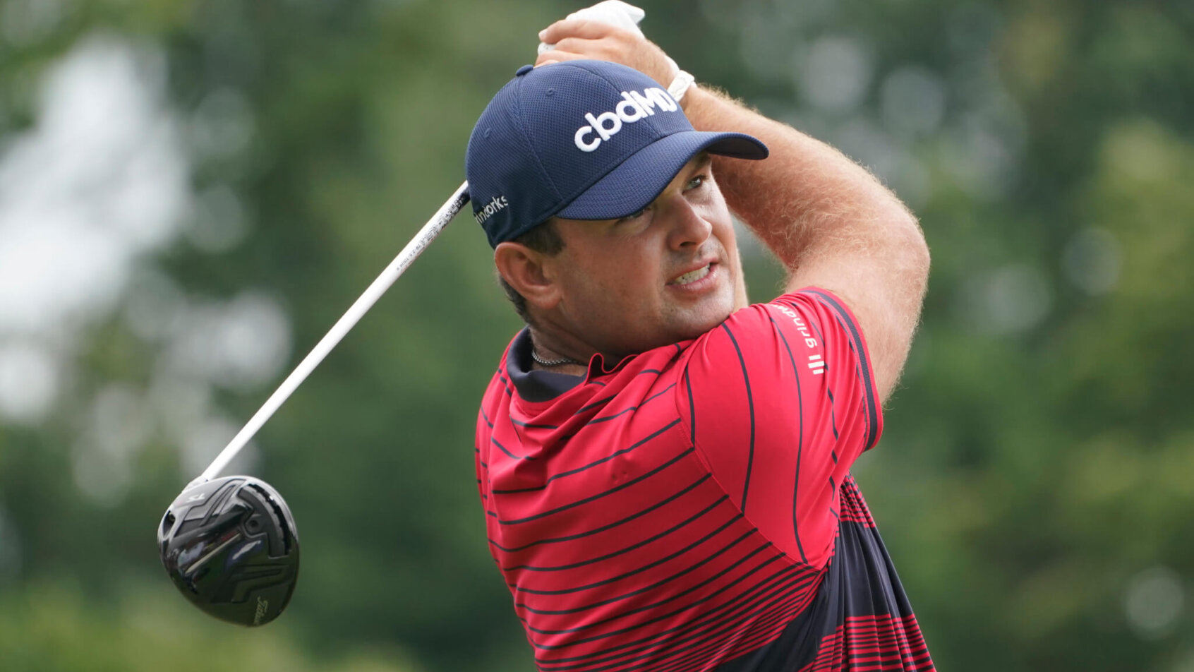Patrick Reed admires a drive