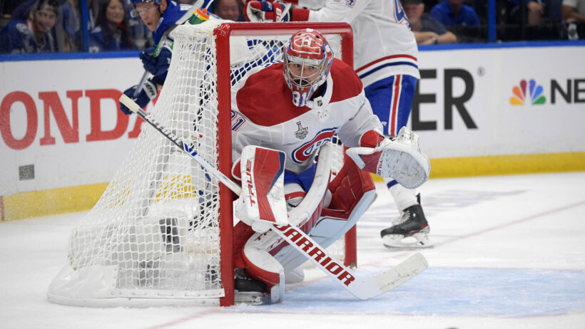 Carey Price looking at puck deep in his net