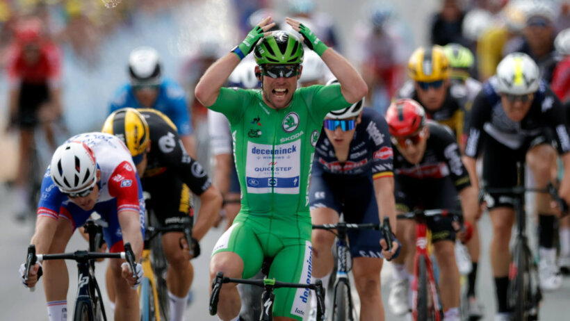 Mark Cavendish celebrates after winning a sprint finish at the 2021 Tour de France