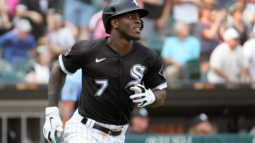 Chicago White Sox's Tim Anderson watching his home run after he hit it.