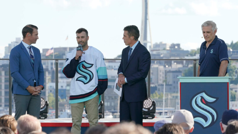 Jordan Eberle holding mic
