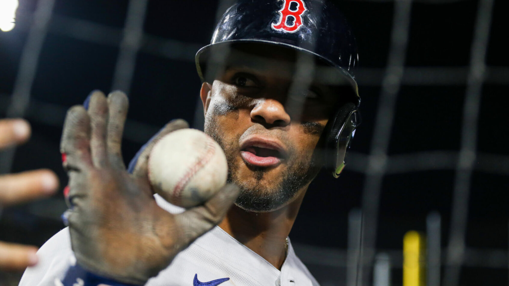 Xander Bogaerts holding a baseball