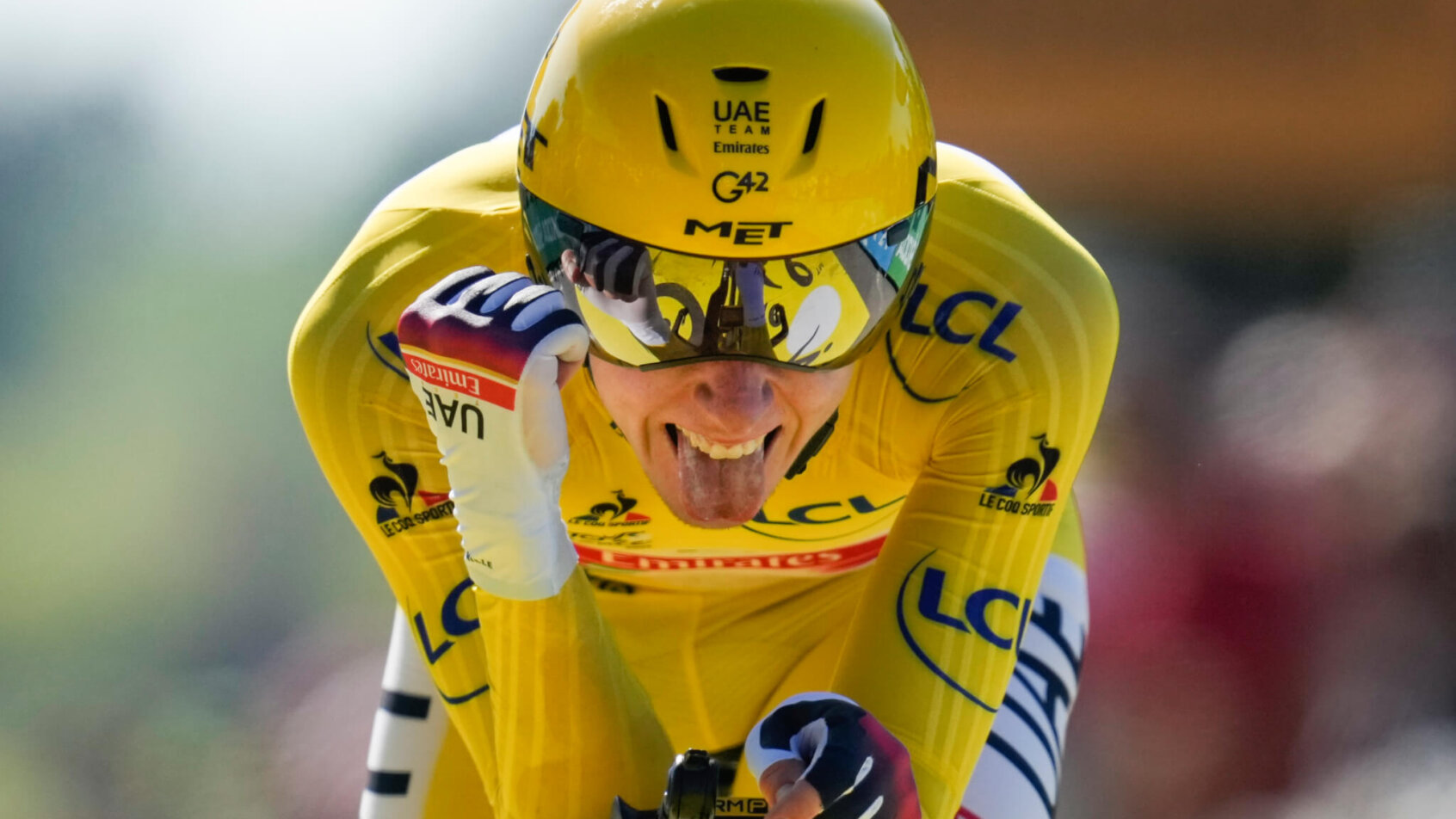 Tadej Pogacar celebrates at the Tour de France