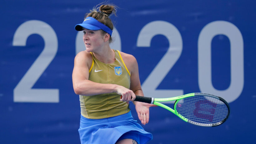 Elina Svitolina hitting a return to her opponent during a match at the Olympics.