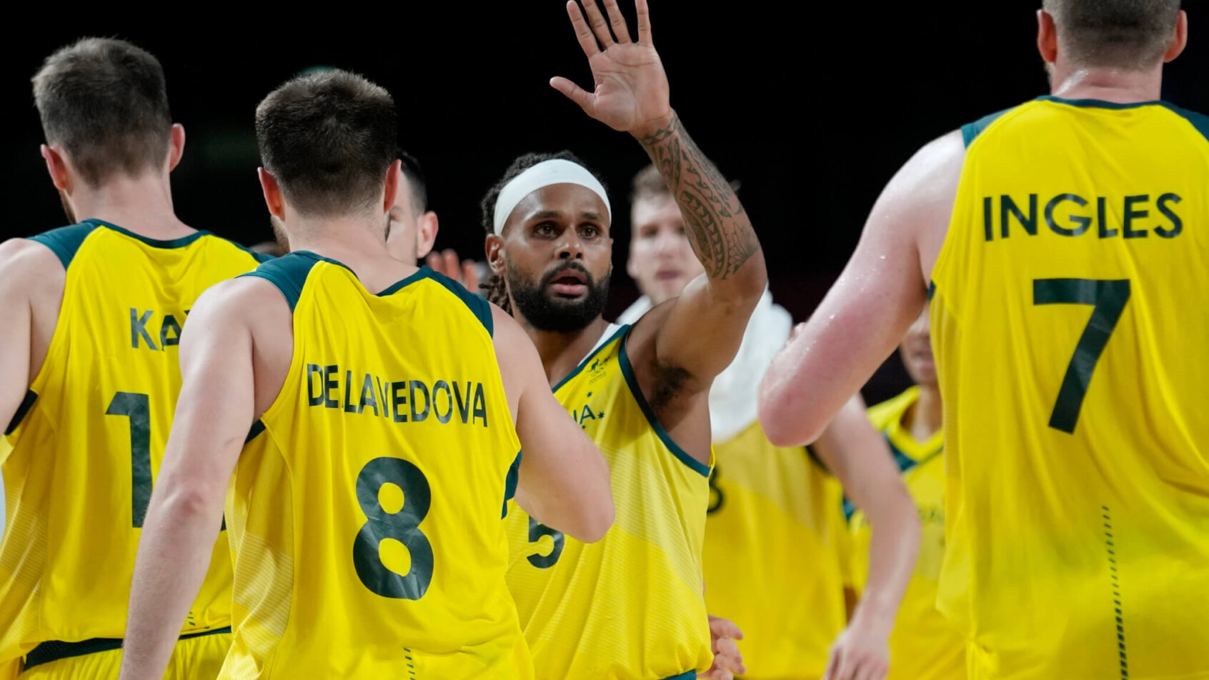 Patty Mills celebrates