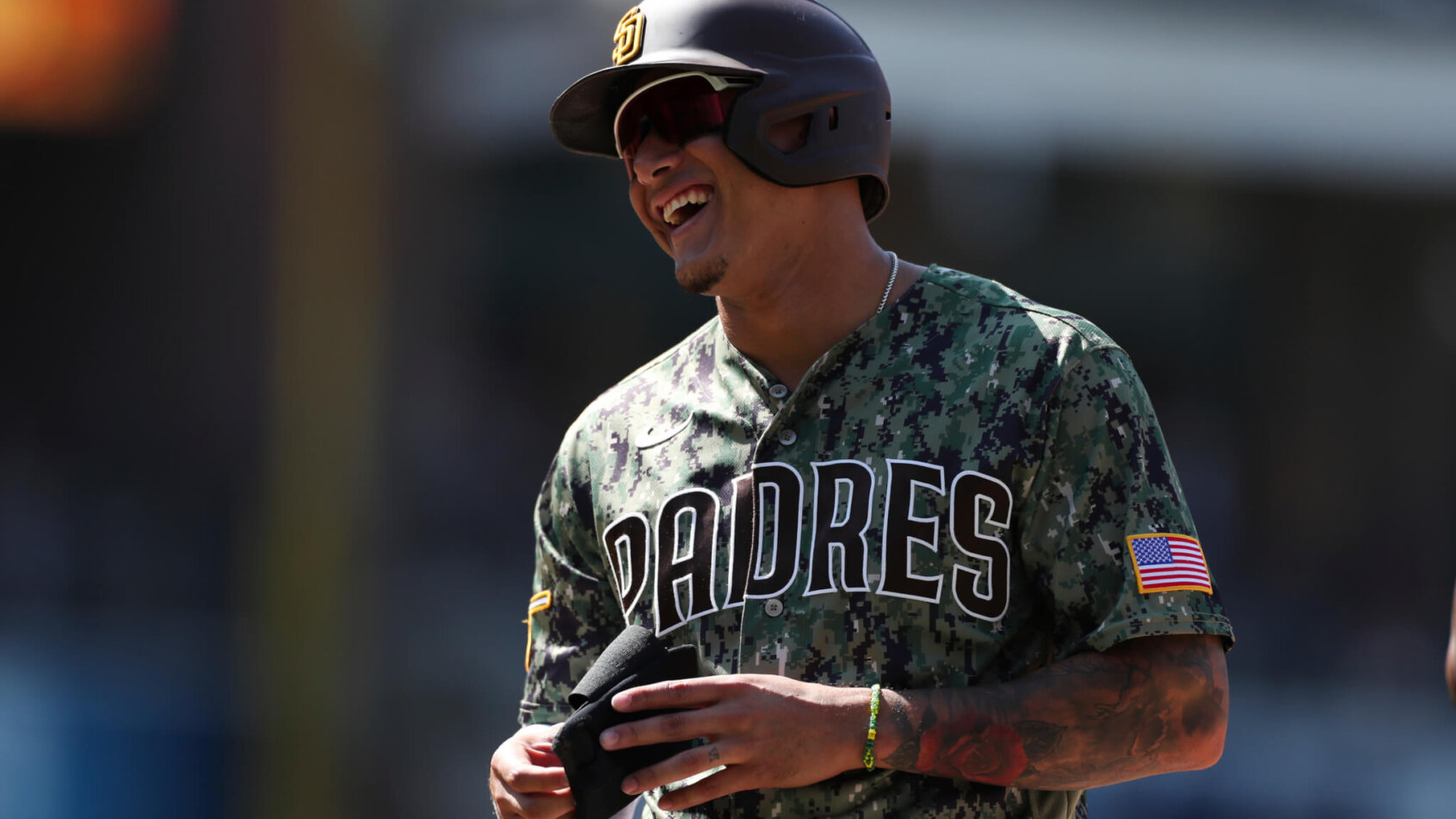 Manny Machado laughs on the base path