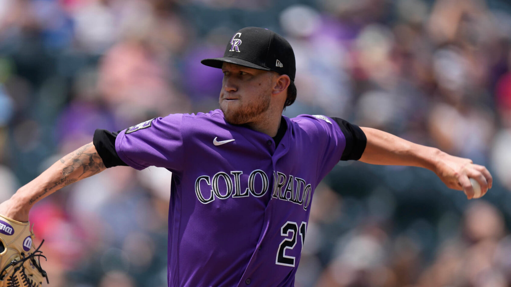 Kyle Freeland throwing pitch