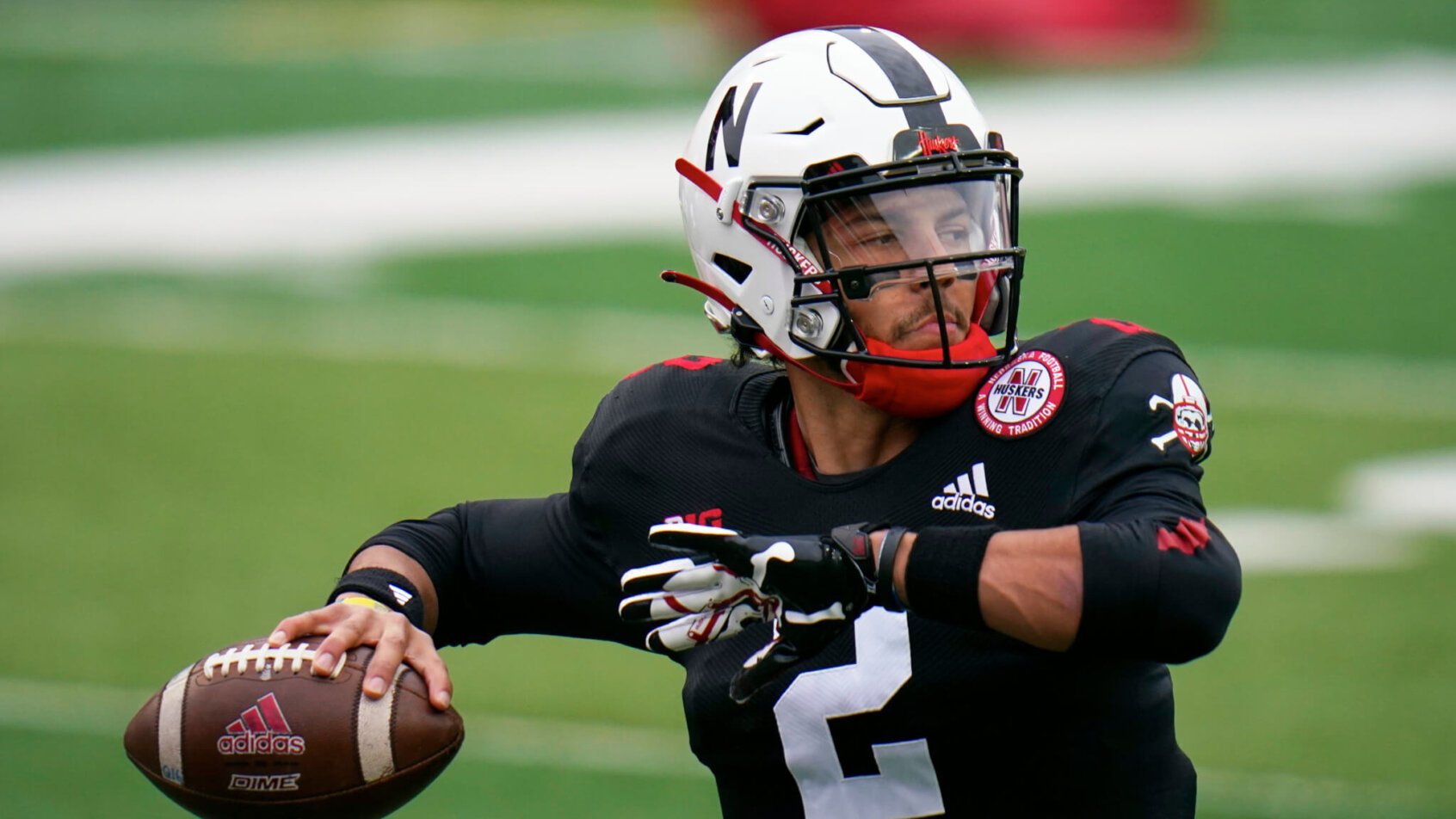 Adrian Martinez throws pass