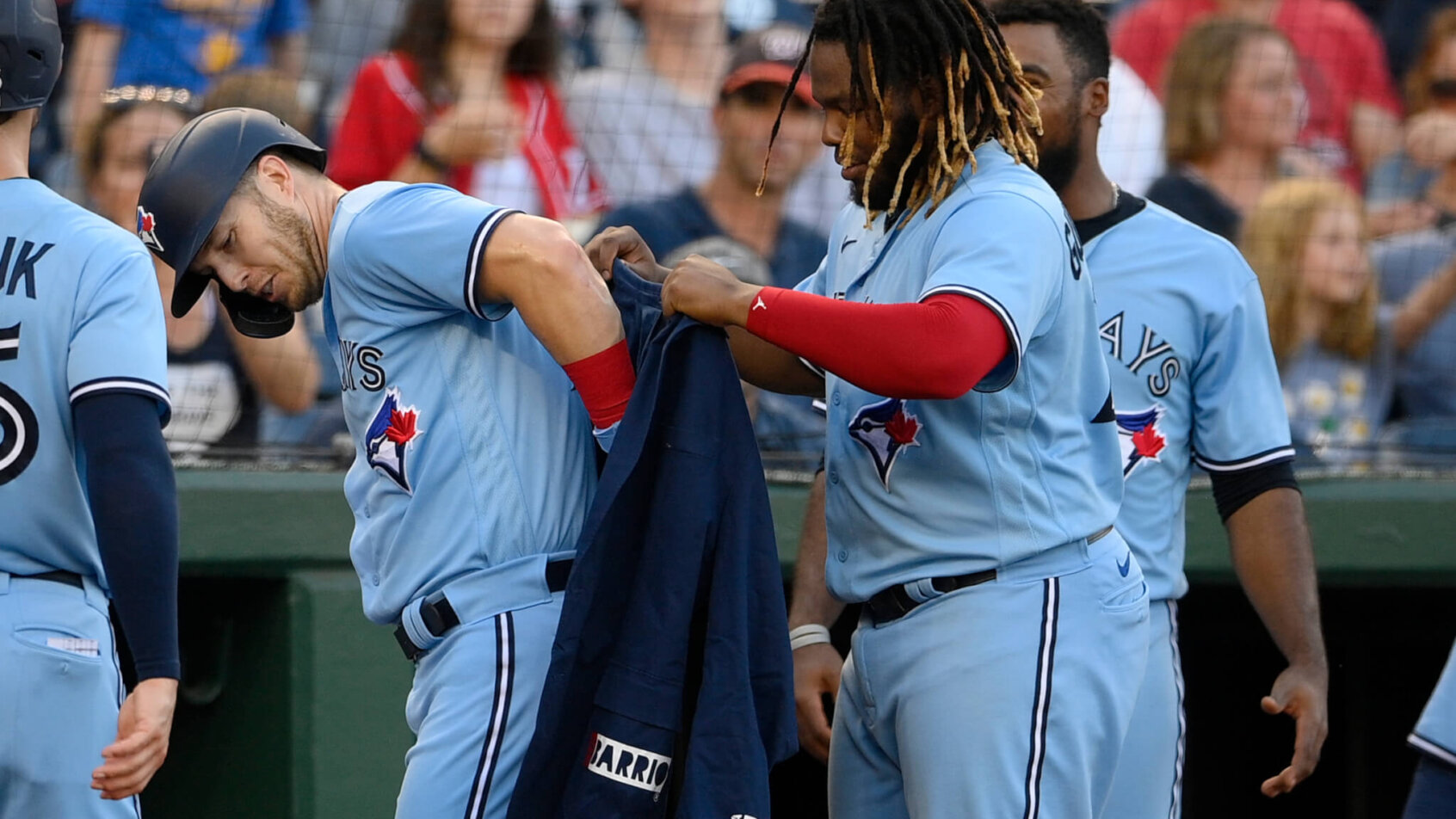 Vladimir Guerrero Jr puts a jacket on Corey Dickerson