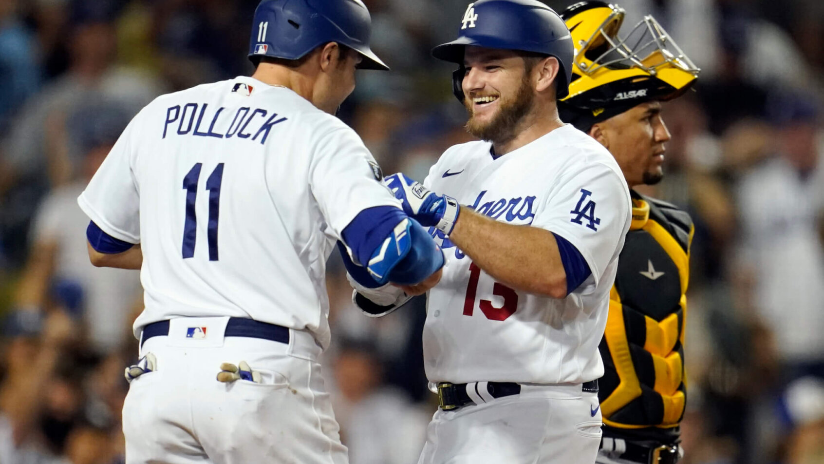 Max Muncy and AJ Pollock celebrate