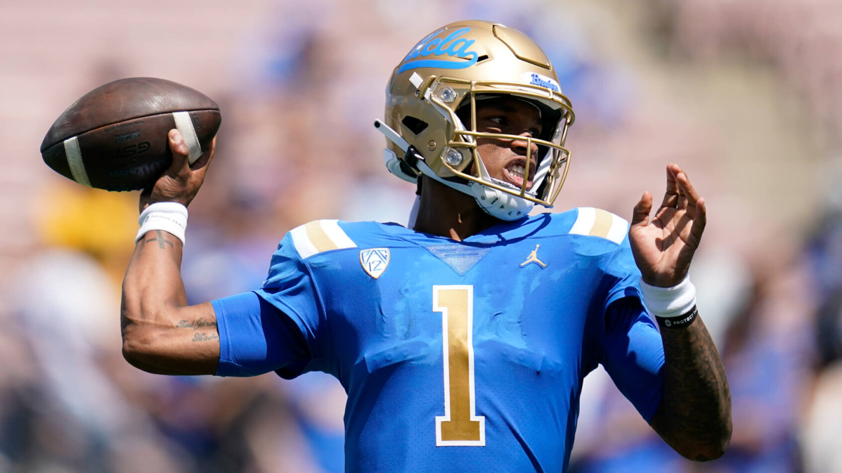 UCLA Bruins quarterback Dorian Thompson-Robinson throwing a pass