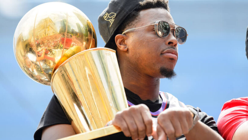Kyle Lowry holding NBA title