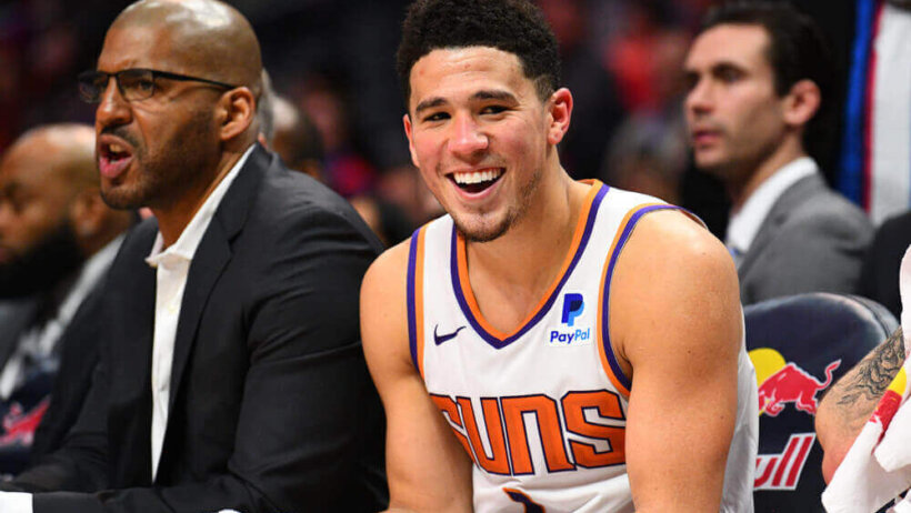 Devin Booker smiling