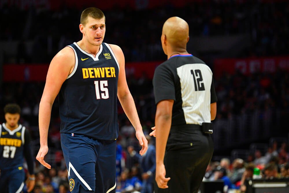Nikola Jokic talking to ref