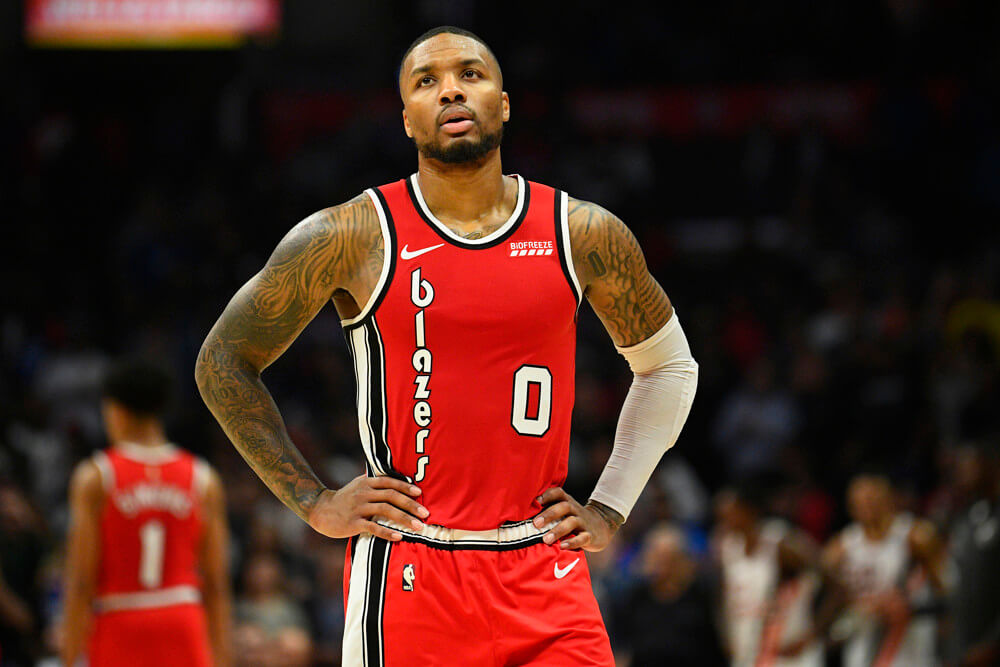 Damian Lillard hands on hips