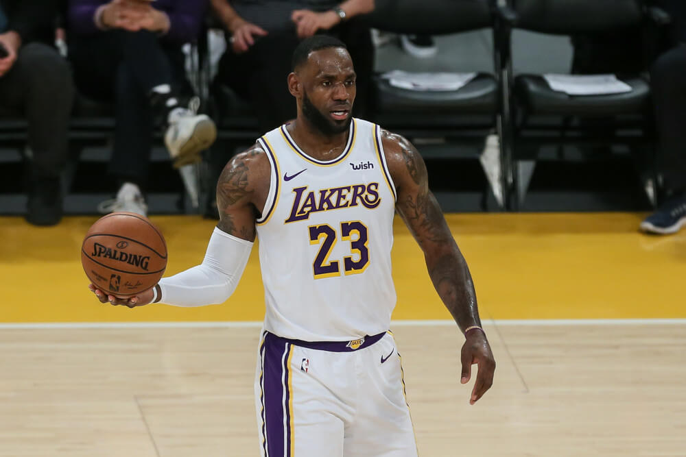LeBron James holding ball with right hand