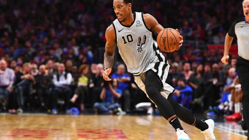 DeMar DeRozan dribbling with left hand