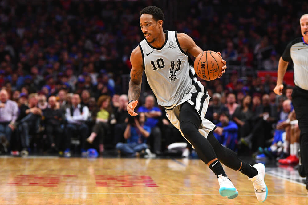 DeMar DeRozan dribbling with left hand