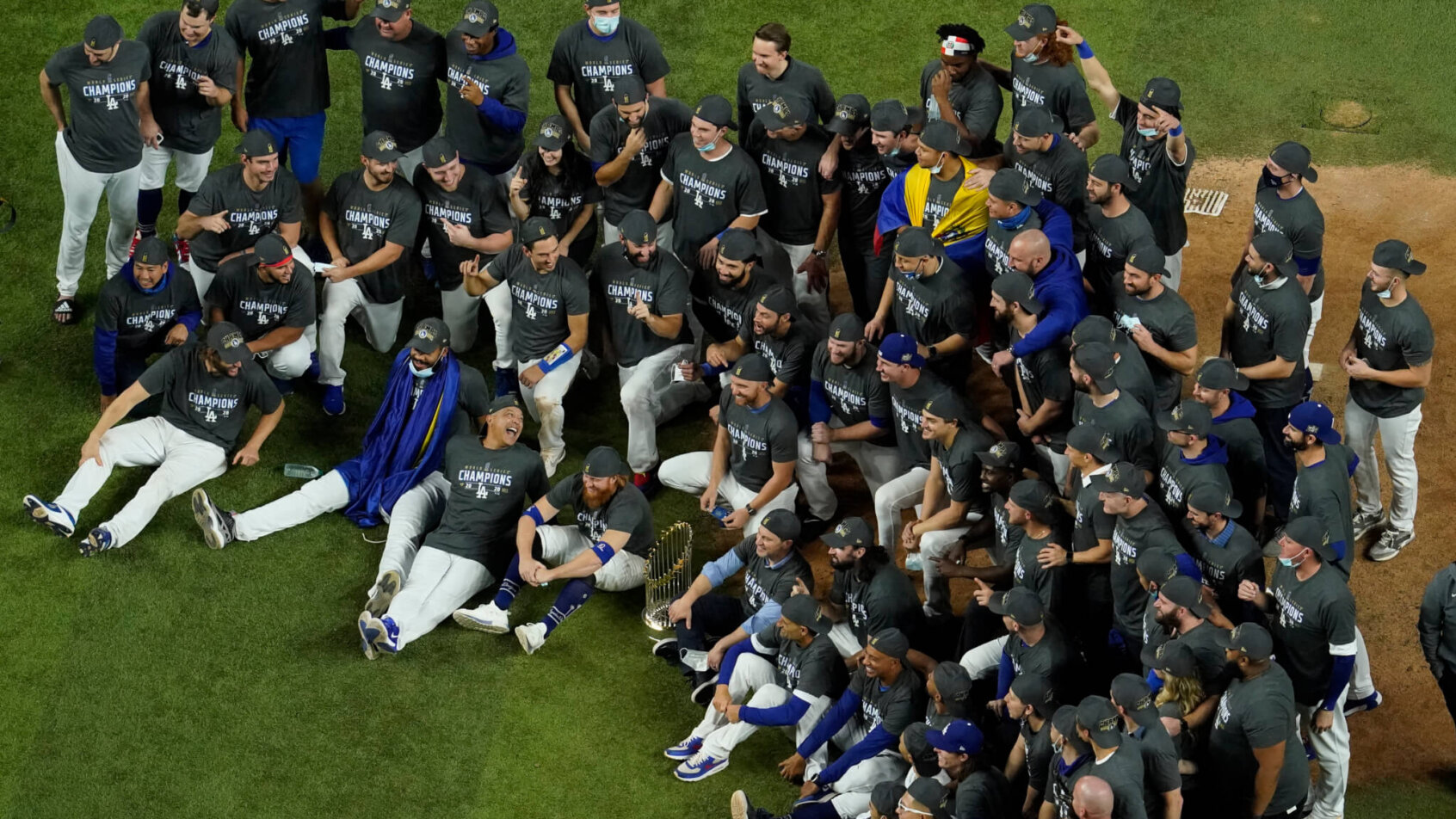 Los Angeles Dodgers pose for a group picture after defeating the Tampa Bay Rays 3-1 to win the 2020 World Series