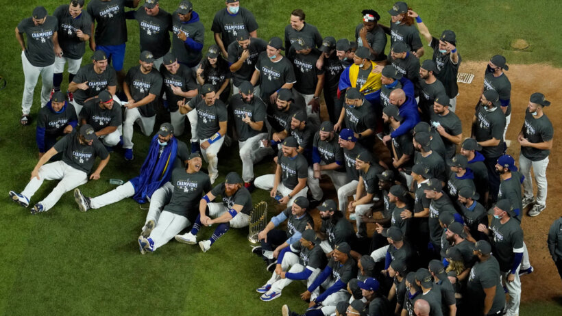 Los Angeles Dodgers pose for a group picture after defeating the Tampa Bay Rays 3-1 to win the 2020 World Series