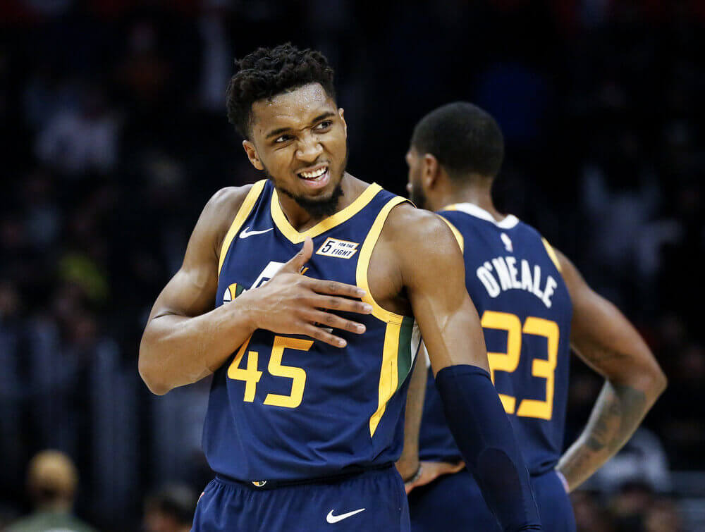 Donovan Mitchell tapping his chest