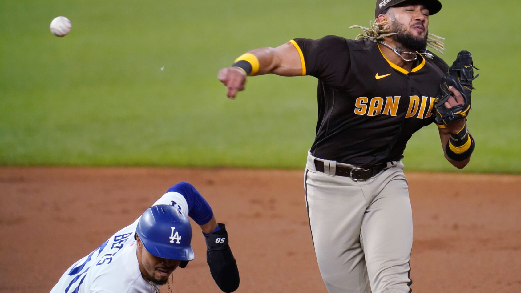 San Diego Padres' Fernando Tatis Jr turning a double play