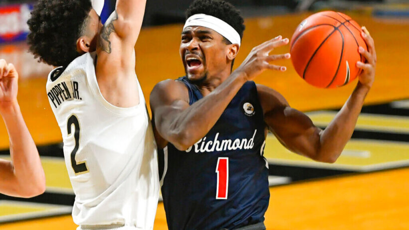 Richmond guard Blake Francis takes the ball to the basket