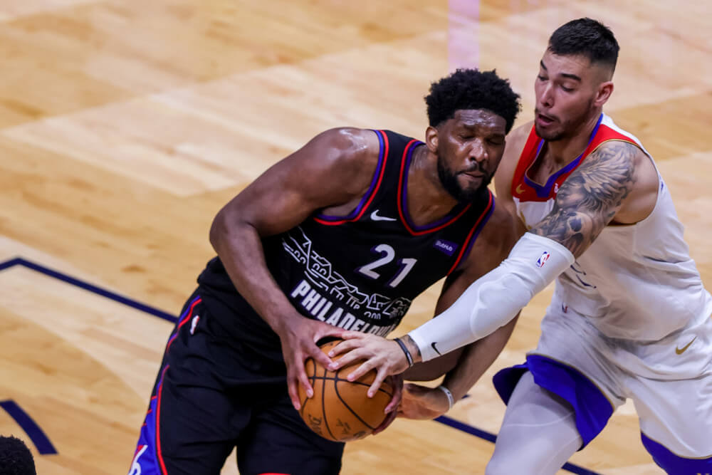 Joel Embiid drives to the hoop