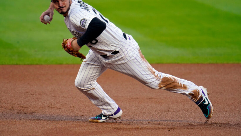 Nolan\ Arenado making a throw
